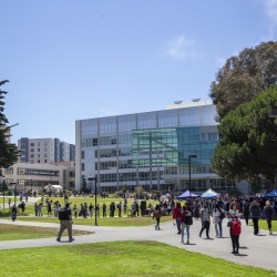 The library and quad, with many students walking around.